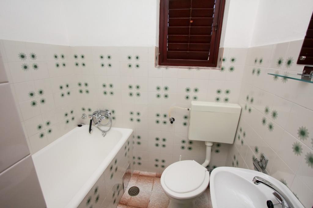 Apartments And Rooms Porto Ražanj Quarto foto